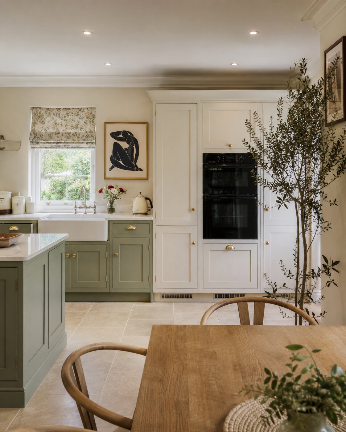 Green and cream in-frame kitchen in Essex