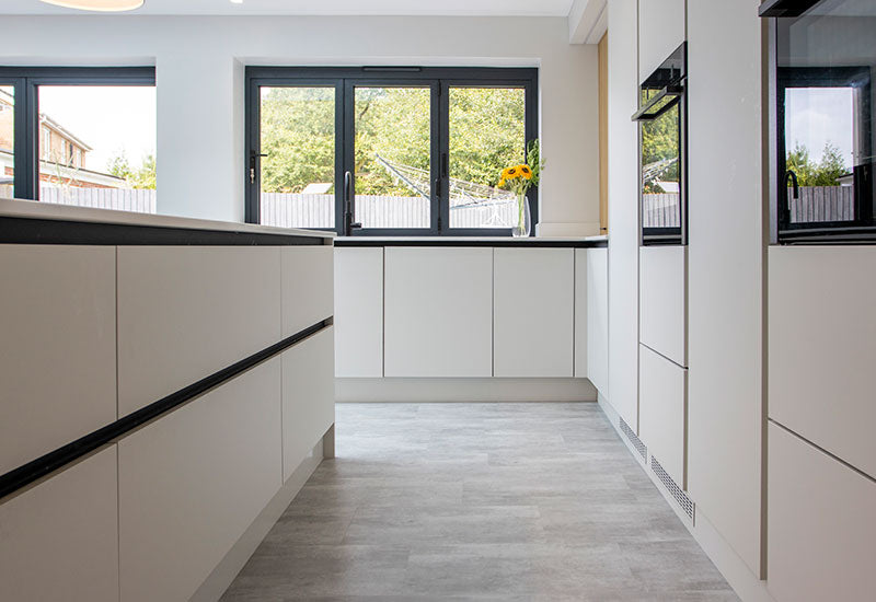 White handleless kitchen in Colchester